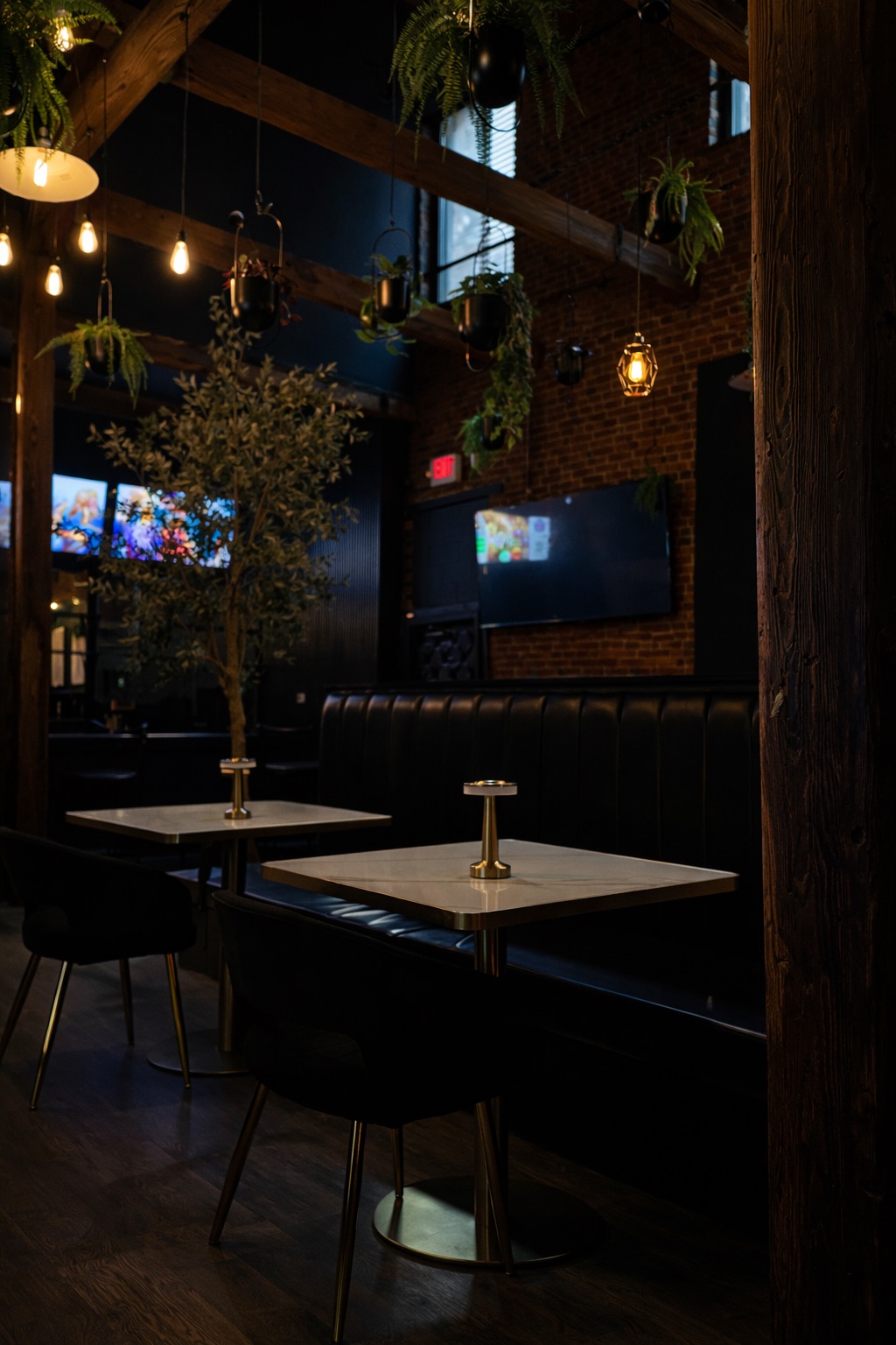 Booth seating under exposed wooden beams