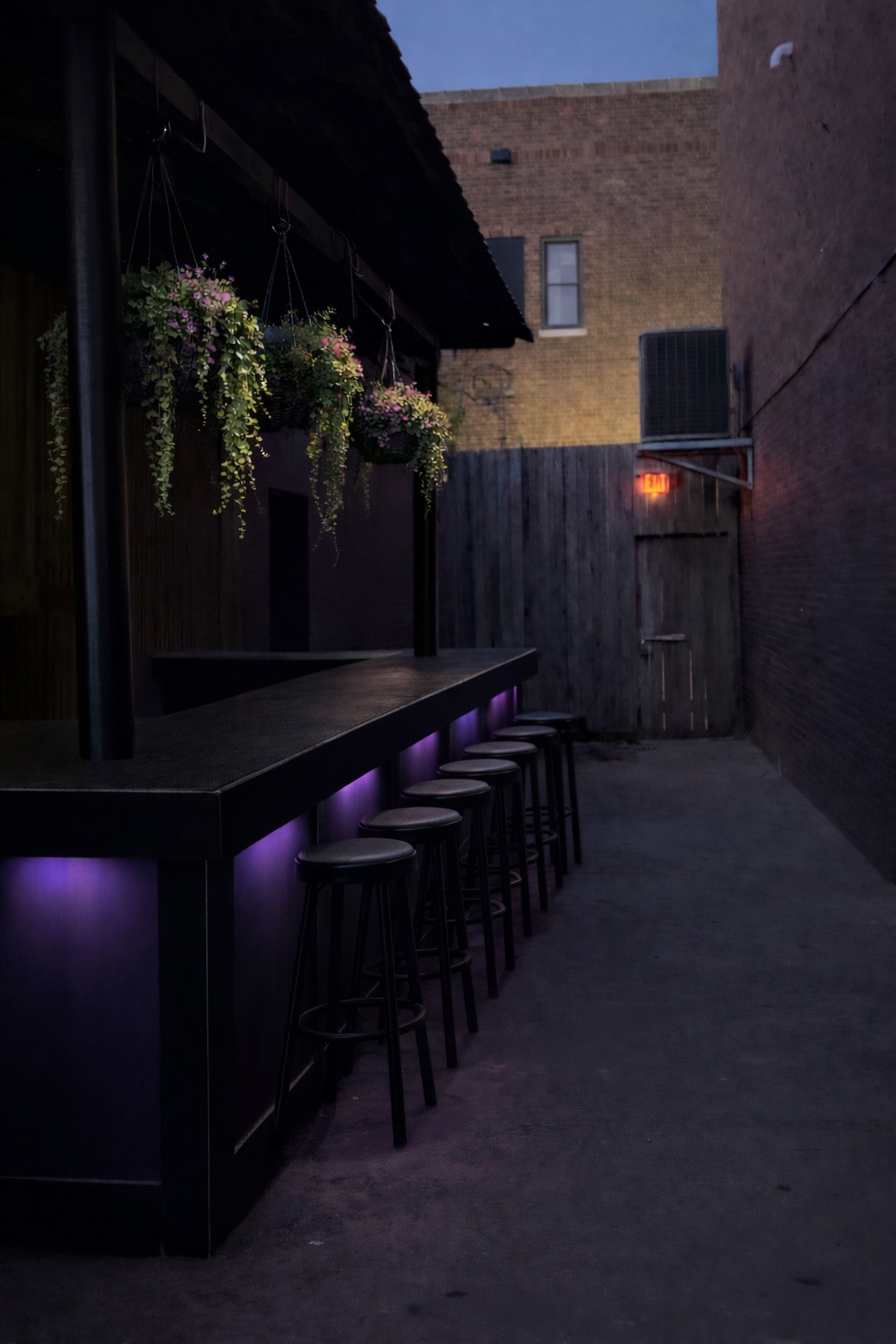 Outdoor patio bar with purple under-lighting